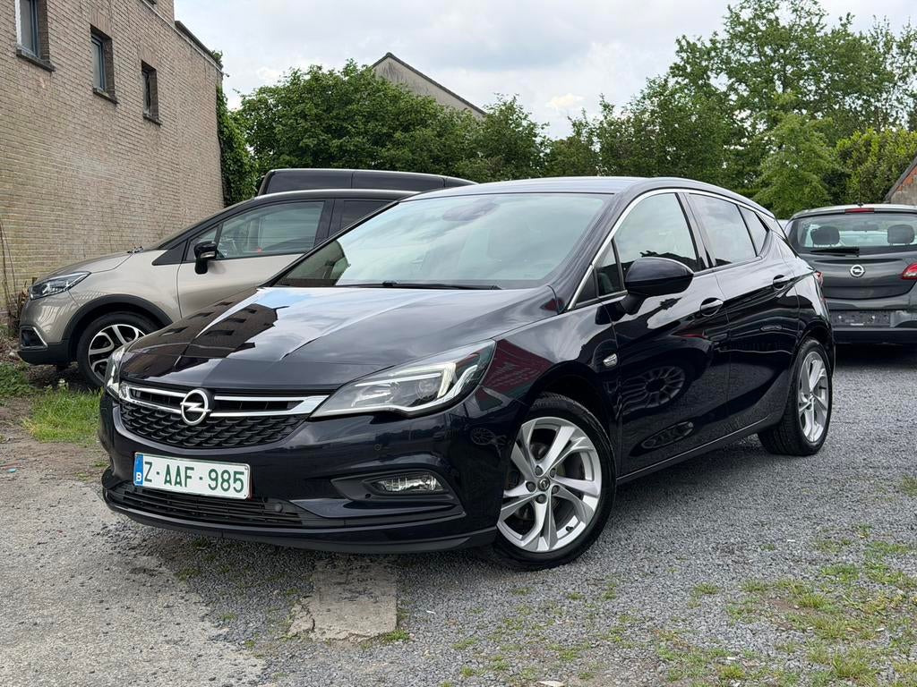 Opel Astra 1.4 Turbo Innovation – Navi – Camera – Cruise, Auto's, Voorwielaandrijving, 4 cilinders, Blauw, Leder en Stof