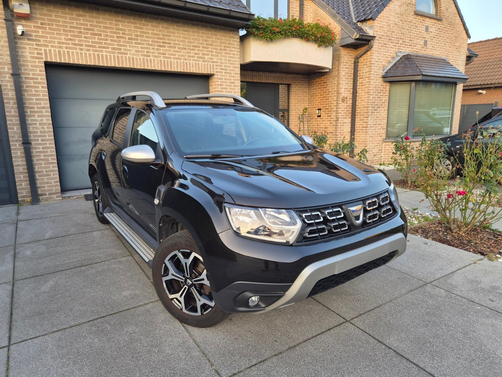 Dacia Duster 1.3 TCe Rainbow * CRUISE / CAMERA / NAVI *, Auto's, Euro 6, Duster, Zwart, Verwarmde buitenspiegels