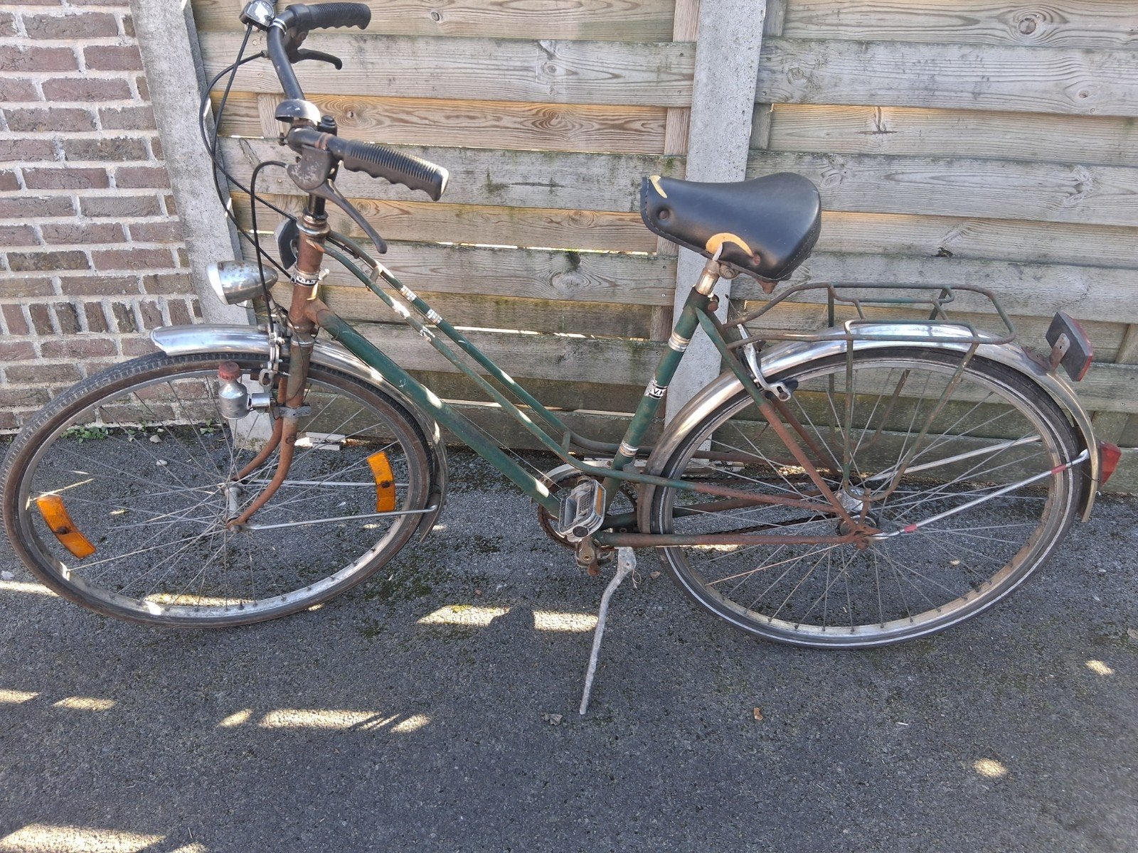 dames fiets, Ophalen