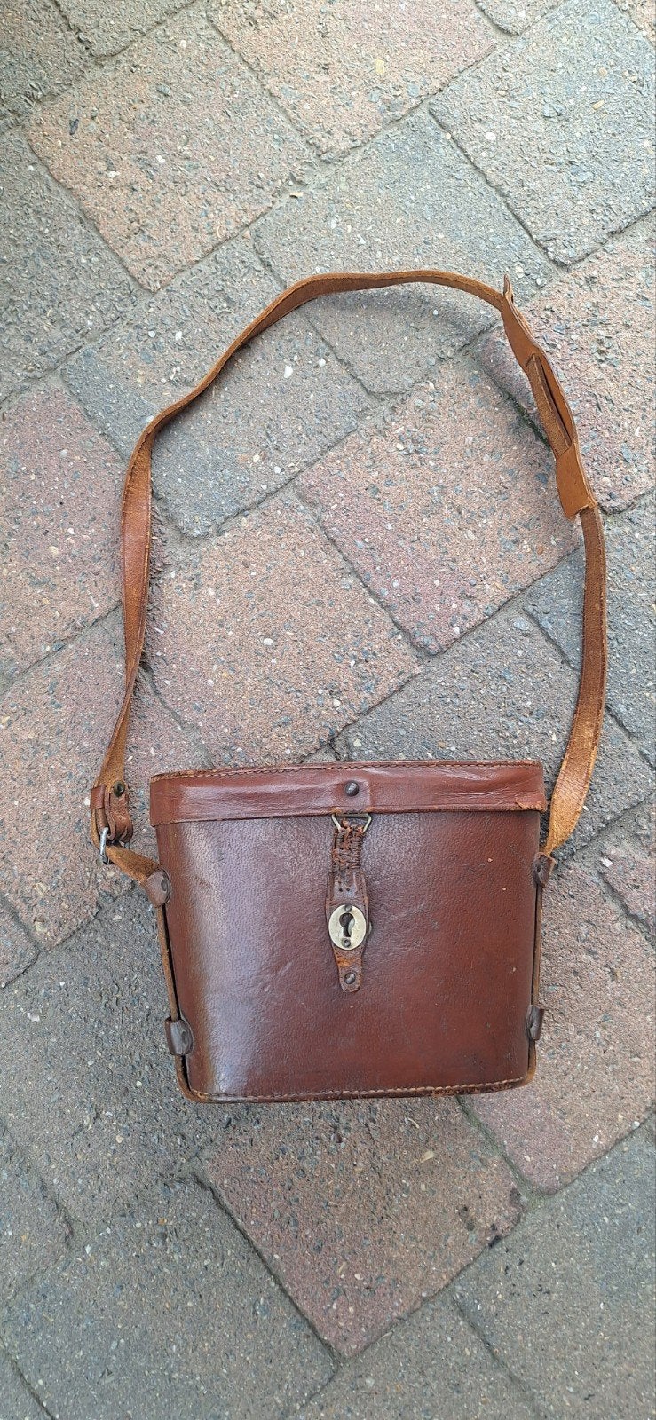 ABBL verrekijkerhoesje, Ophalen