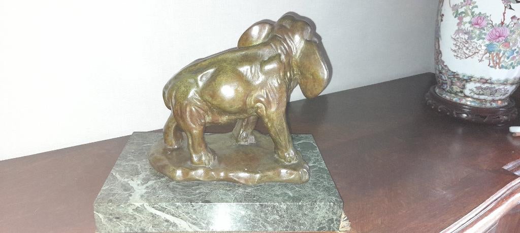 Bronzen olifant, Ophalen