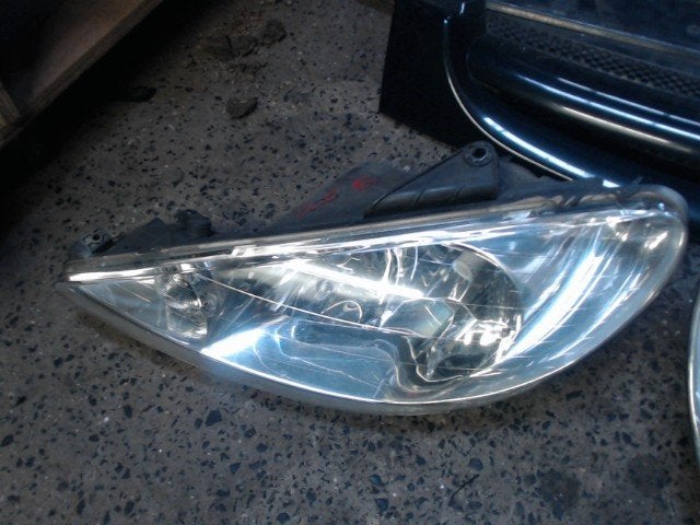 Optique avant gauche Peugeot 206 1998-2009 LP/15738, Autos : Pièces & Accessoires, Enlèvement, Utilisé, Peugeot