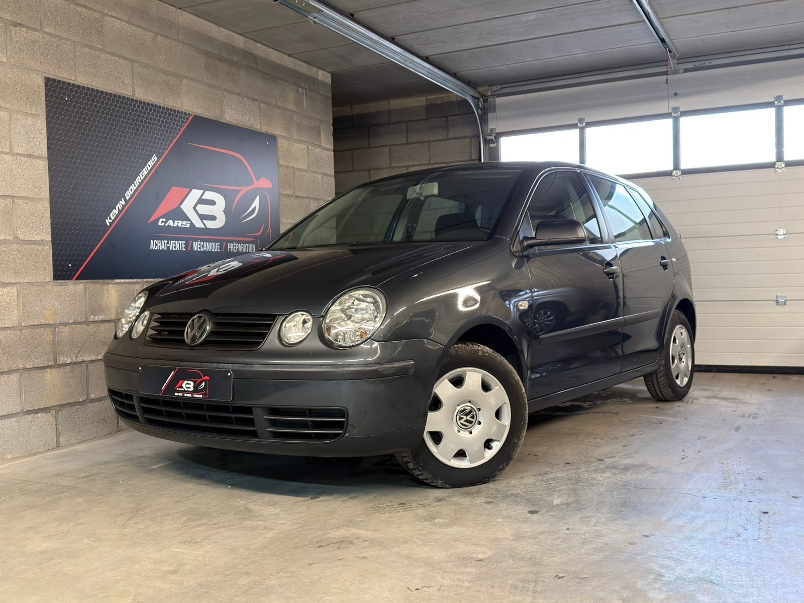 VW Polo 9N1 • 100.000 Kms • 1.2 Benzine 65PK • 2005, Auto's, Voorwielaandrijving, Dealer onderhouden, Stof, Zwart