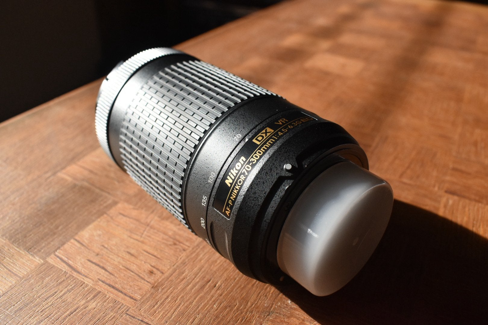 Nikon AF-P 70-300mm F/4.5-6.3G ED VR DX, Enlèvement ou Envoi, Comme neuf, Nikon, Bouchons d'objectif