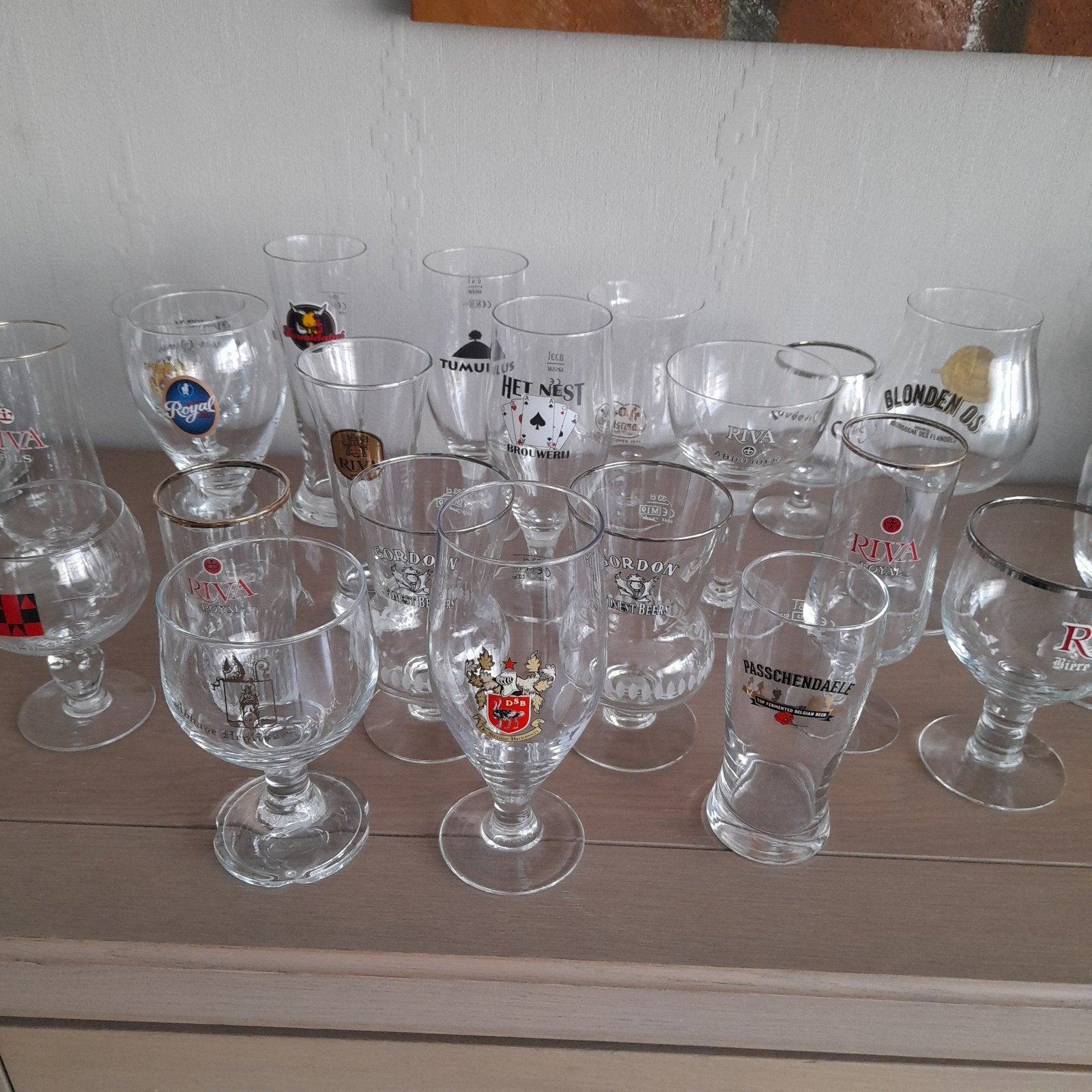 Lot van 23 bierglazen - verschillende merken., Verzamelen, Ophalen, Glas of Glazen