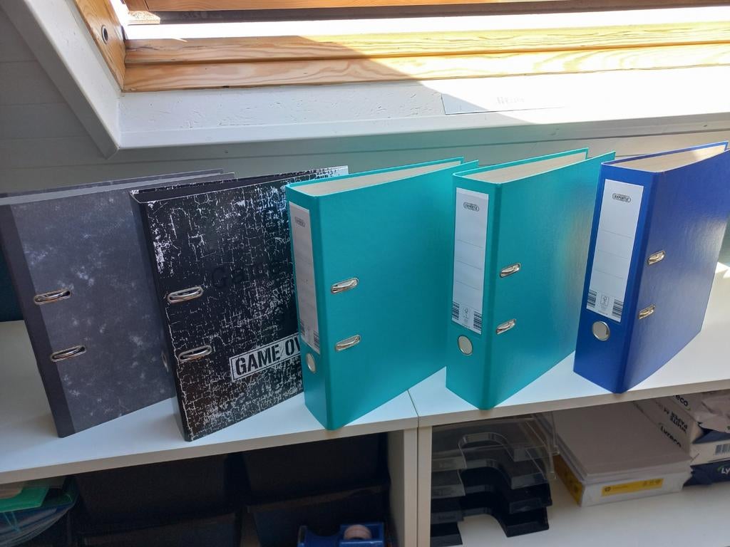 bureau mappen, Enlèvement