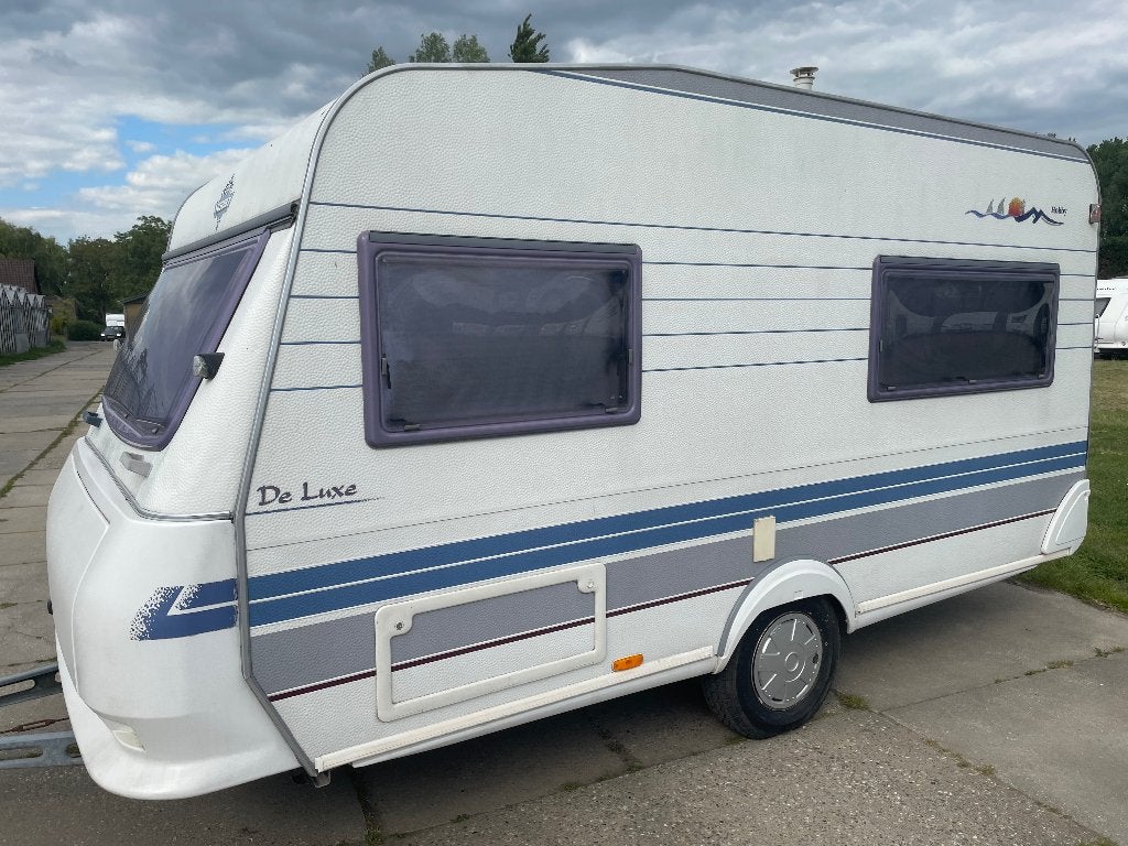 Caravan Hobby 400 Deluxe met voortent en luifel, Caravanes & Camping, Caravanes, Hobby, 750 - 1000 kg, Particulier, 2 lits séparés