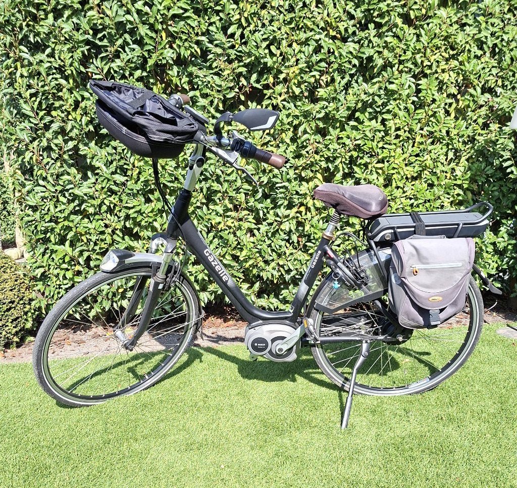 Gazelle elektrische fiets met fietstassen, Ophalen, Zo goed als nieuw, 50 km per accu of meer, 55 tot 59 cm