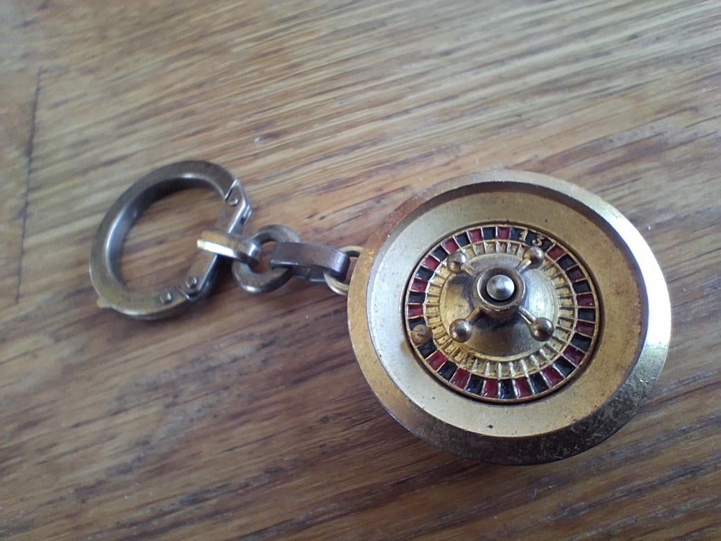 DRAAIENDE roulette sleutelhanger, Ophalen of Verzenden
