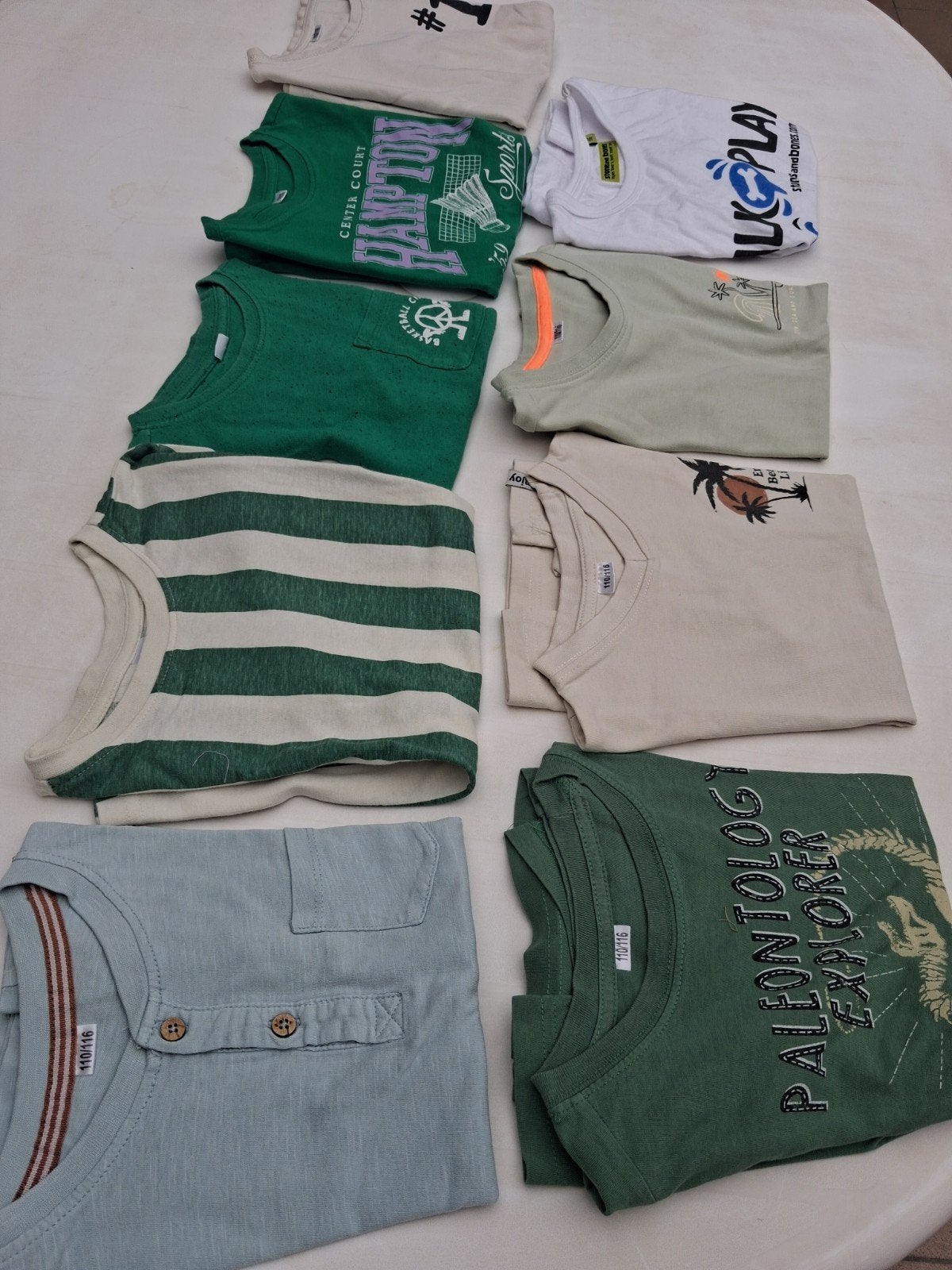 pakket T-shirts  sweaters shorts .....  uit te, Enlèvement