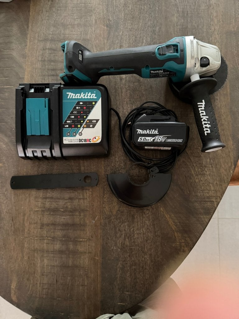 Slijpschijf DGA504 Makita 125mm + 2x 5.0Ah18v + lader, Ophalen of Verzenden, Zo goed als nieuw, Haakse handslijpmachine