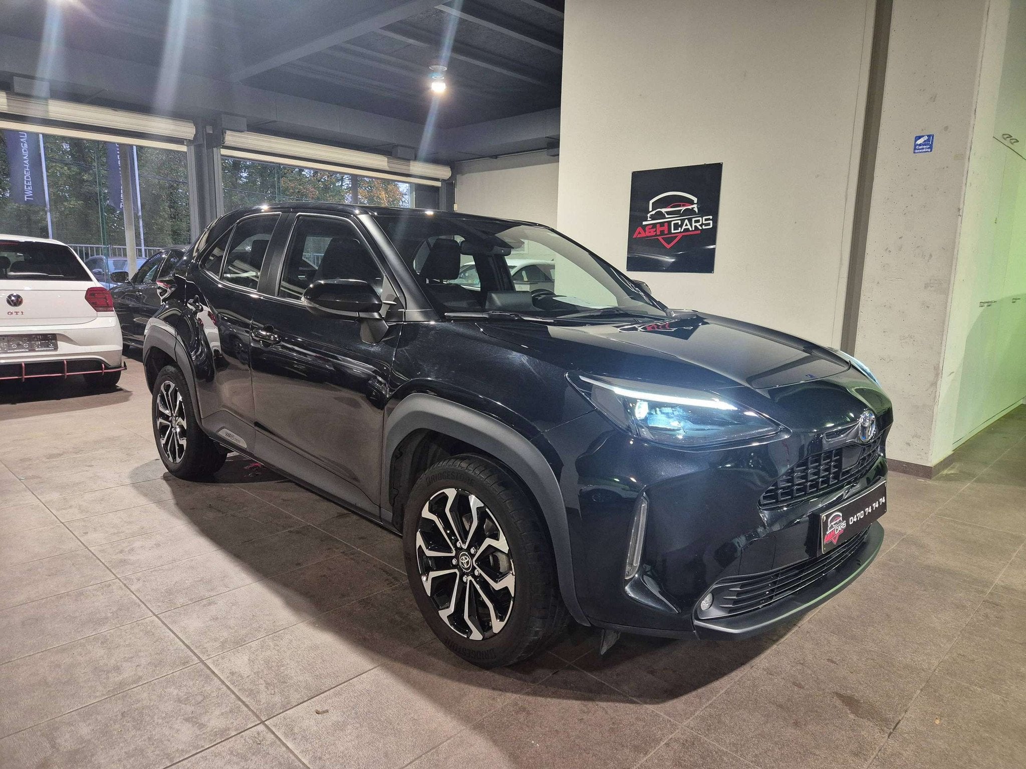 Toyota Yaris Cross Yaris Hybrid 1.5i VVT-i E-CVT GR Sport, Auto's, Stof, Gebruikt, Zwart, 1490 cc