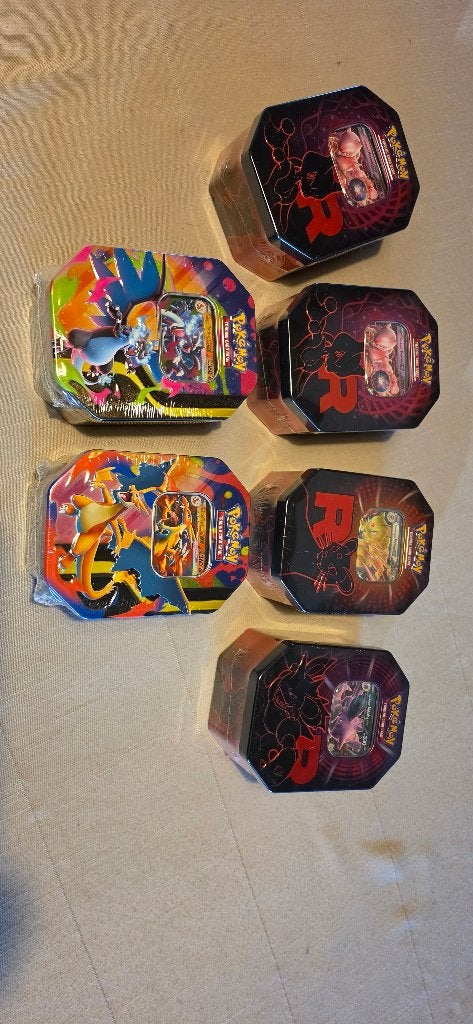 6x Pokemon Tin set - Team Rocket / Mega Charizard, Ophalen, Nieuw, Boosterbox, Foil