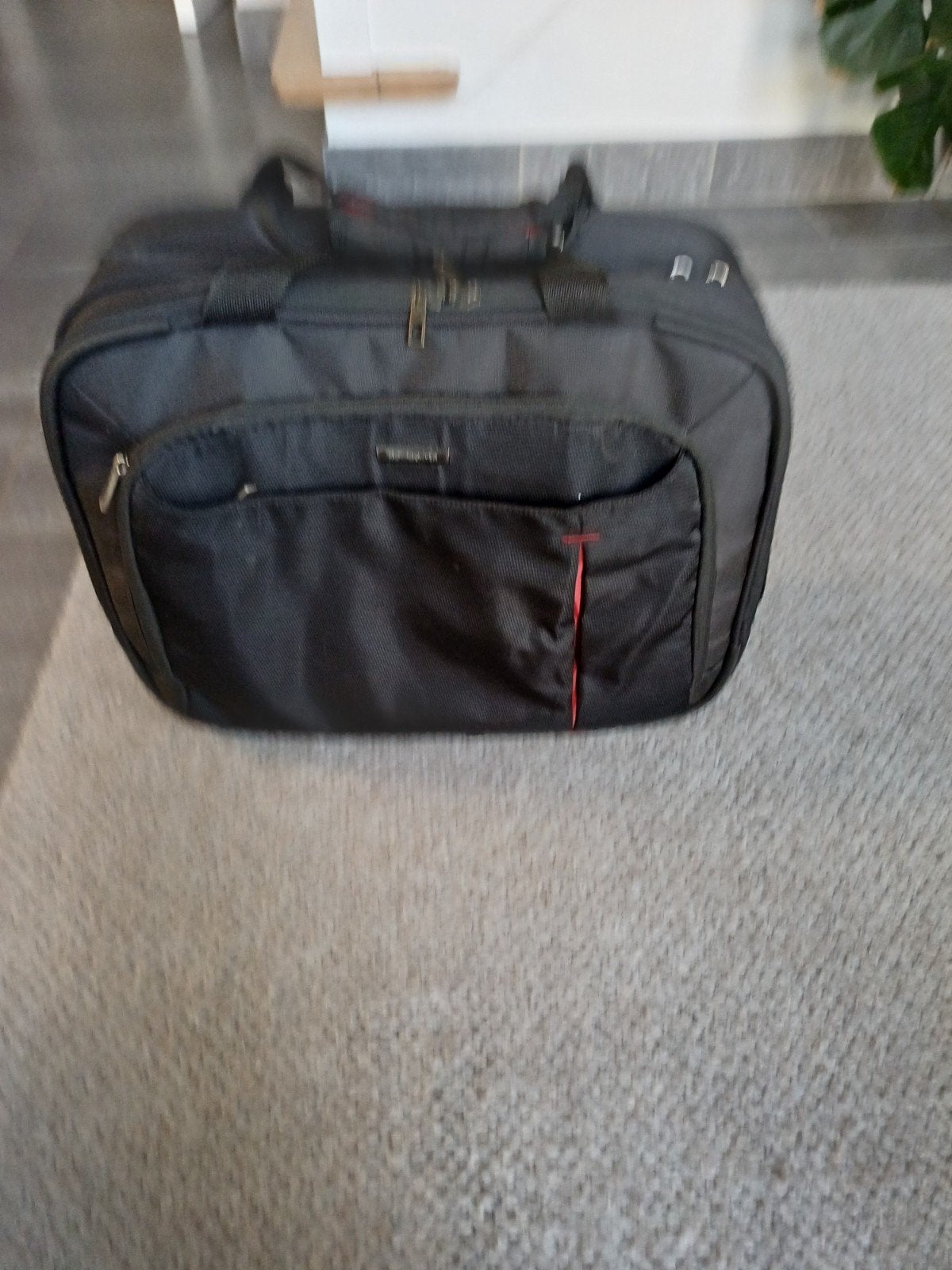 Laptoptas/aktetas Samsonite, Ophalen
