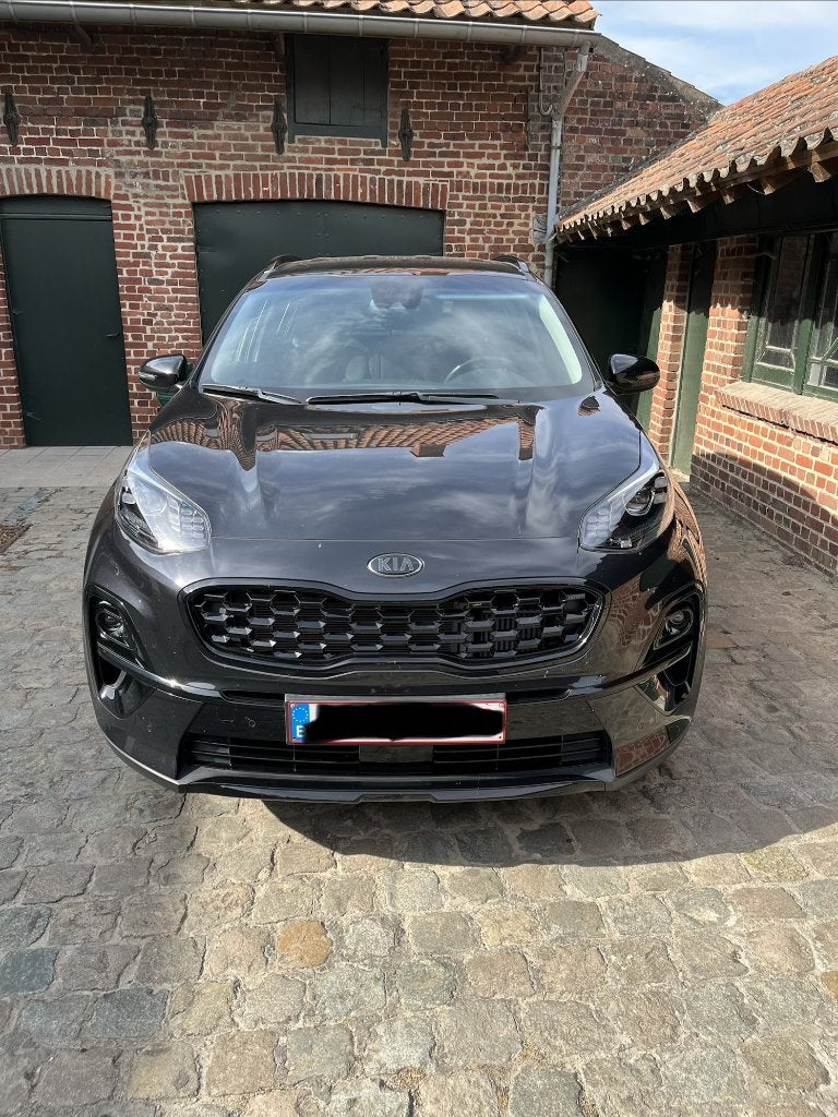 Kia Sportage 1.6 Turbo 115ch Black Edition Garantie 12/28, Auto's, Kia, Voorwielaandrijving, 4 cilinders, Leder en Stof, Zwart