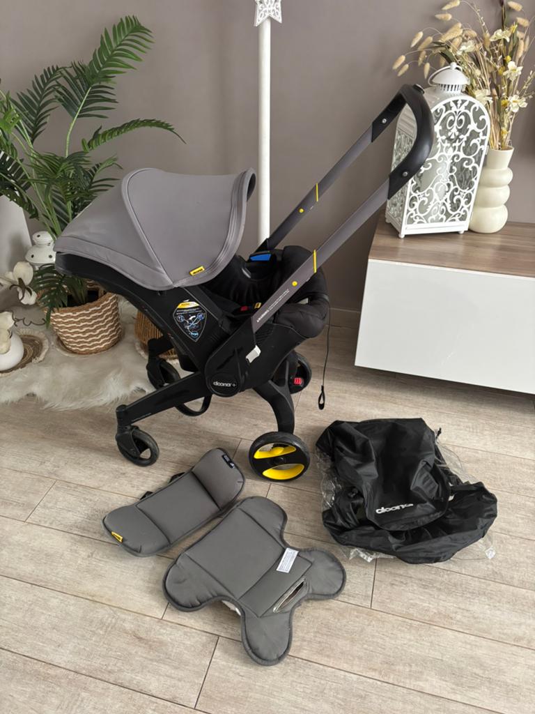 Poussette DOONA+ avec réhausseur et protection pluie, Enlèvement, Comme neuf, Poussette