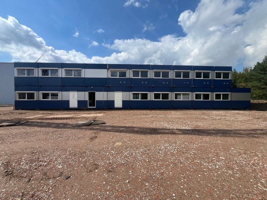 Multifunctioneel unitgebouw met 21 units, Ophalen