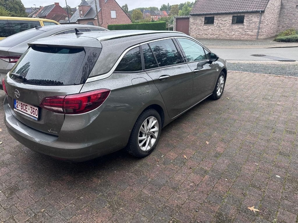 Opel Astra Sports Tourer (Business-uitvoering), Voorwielaandrijving, Dealer onderhouden, Leder en Stof, 5 deurs
