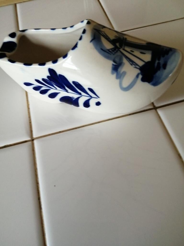 Sabot delft cendrier, Ophalen