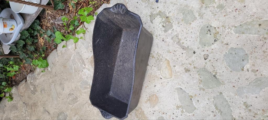 Ouden kolenbak in gietijzer, Ophalen