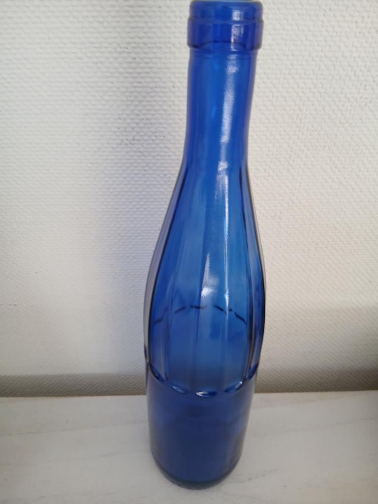 Kobalt blauwe fles, Ophalen