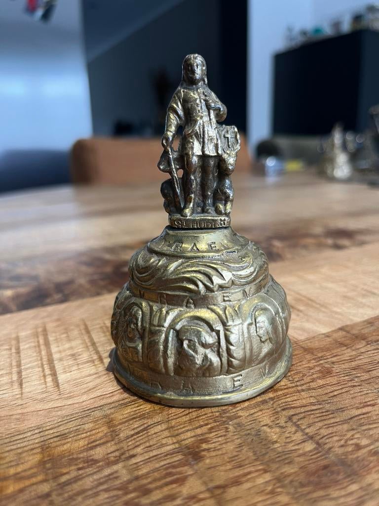 Très jolie vieille cloche de table St Huber à voir, Ophalen of Verzenden, Brons