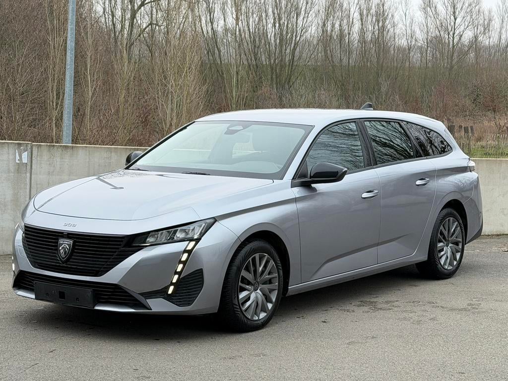 Peugeot 308 SW * 2023 * 1.2i Turbo * 64dkm * Carplay * PDC *, Auto's, Peugeot, Voorwielaandrijving, Dealer onderhouden, Stof, 1198 cc