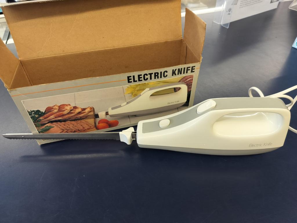 Elektrisch mes met nieuwe messen, Elektronische apparatuur, Ophalen