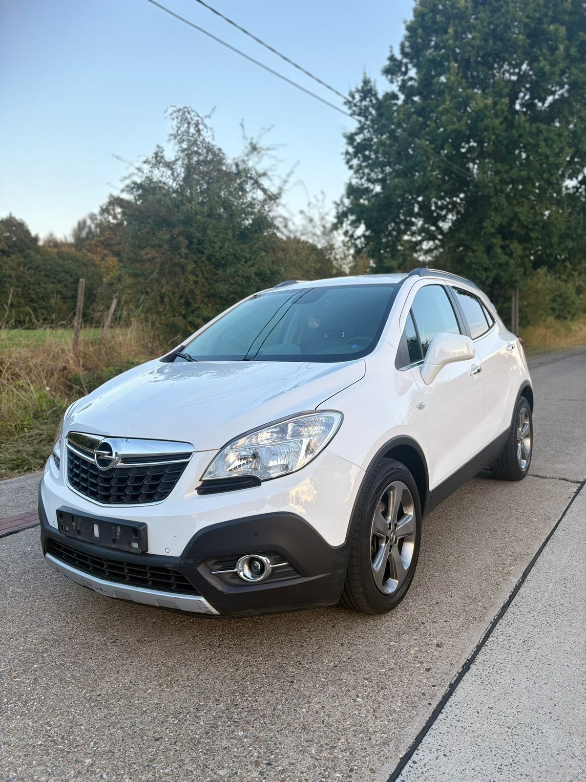 Opel Mokka Cosmo 1.6 benzine 2013 92.000km, Voorwielaandrijving, Euro 5, 4 cilinders, Wit