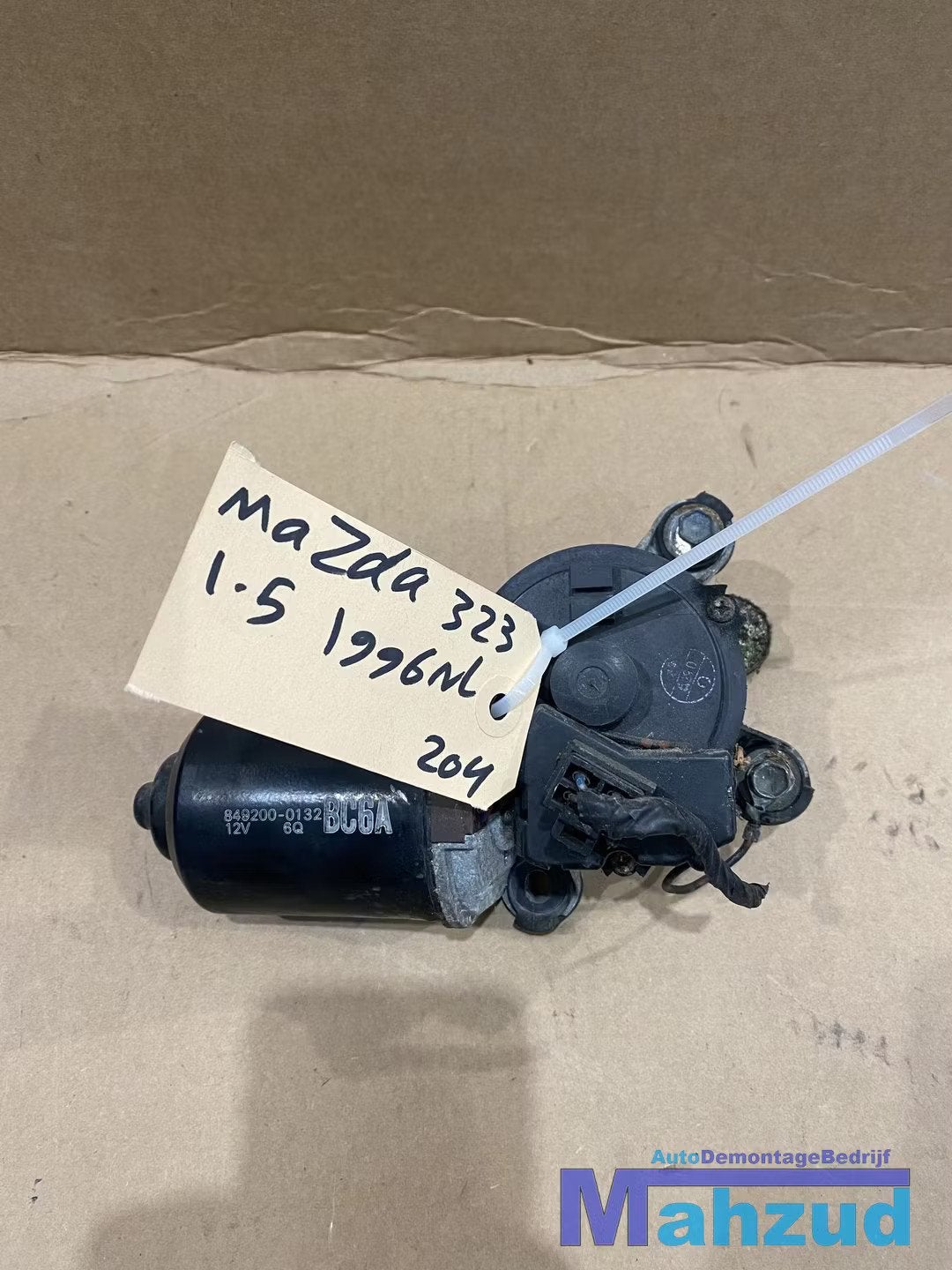 MAZDA 323 F ruitenwissermotor voor 8492000132 1994-1998, Gebruikt, Shinchi, Fuchu-Cho 3-1
730-8670  Hiroshima, Mazda Motor Corporation