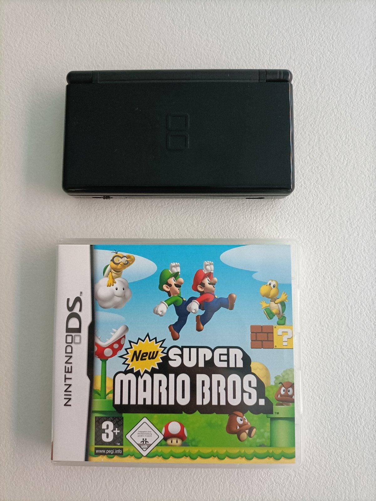 Nintendo DS met 1 game, Games en Spelcomputers, Ophalen, Met games, Zwart, Zo goed als nieuw