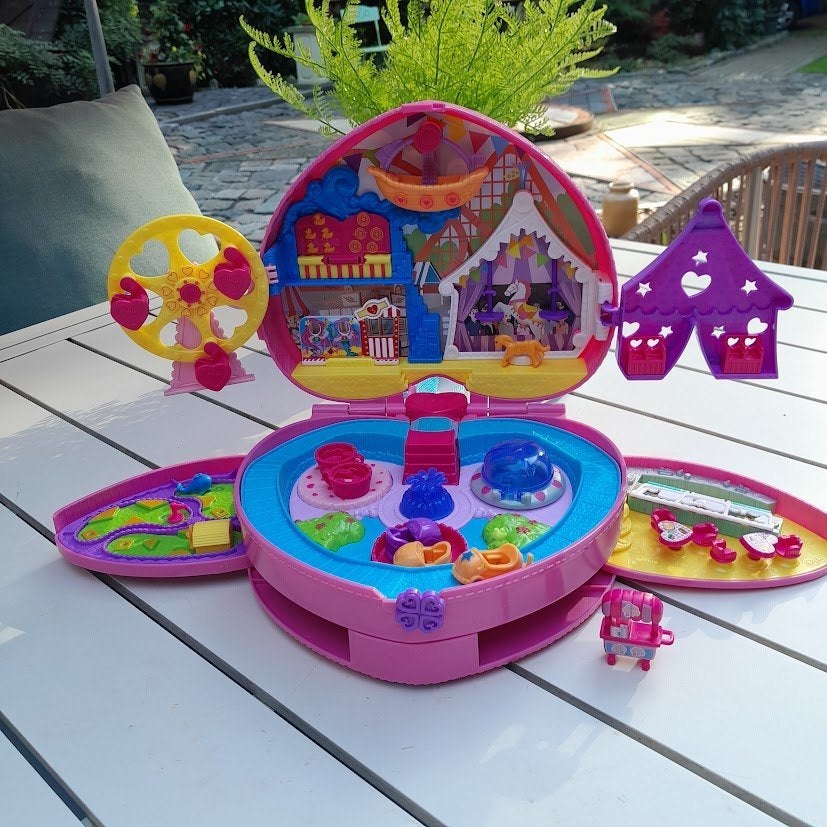 Polly Pocket vintage rugtas "pretpark". Jaren 80., Verzamelen, Ophalen of Verzenden, Zo goed als nieuw