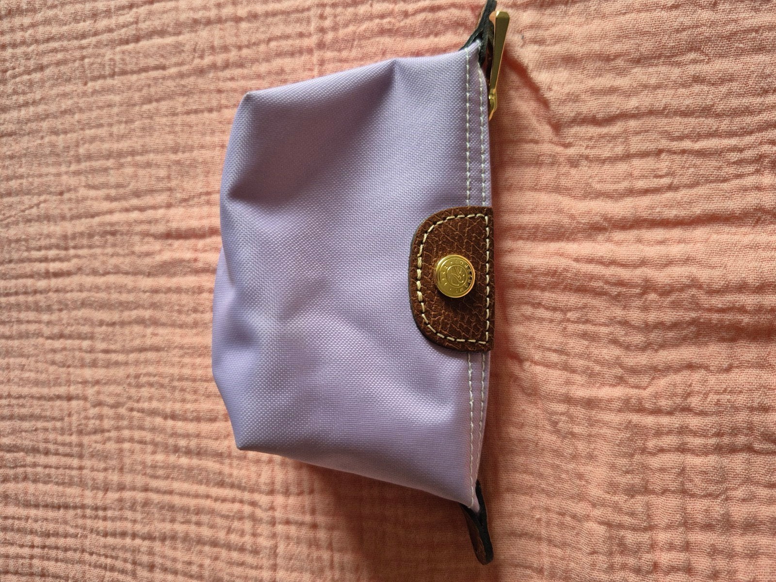 Trousse lilas neuve Longchamp, Enlèvement