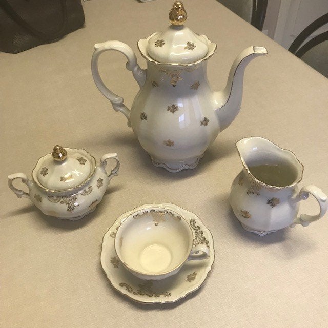 porseleinen koffieservies, Ophalen