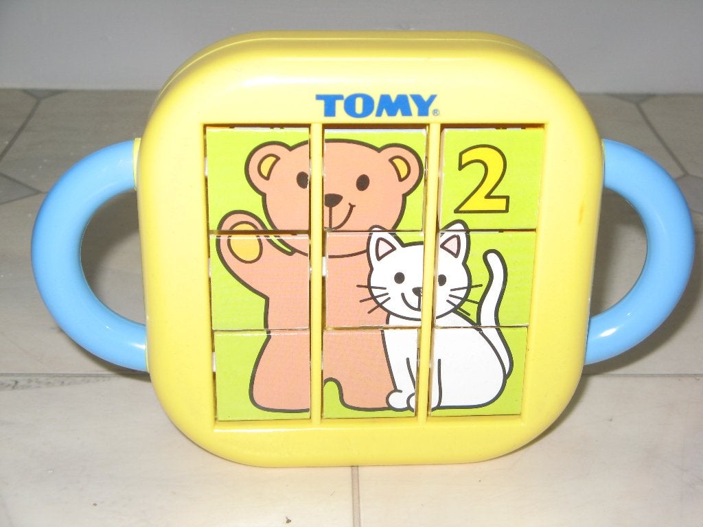 Retro flippuzzel voor baby's van het merk Tomy, Ophalen of Verzenden, Minder dan 10 stukjes, Gebruikt, 6 maanden tot 2 jaar