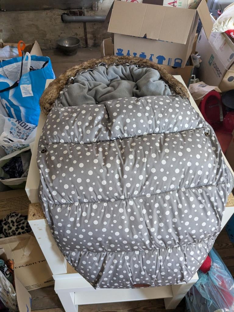 Voetenzak kinderwagen, Ophalen