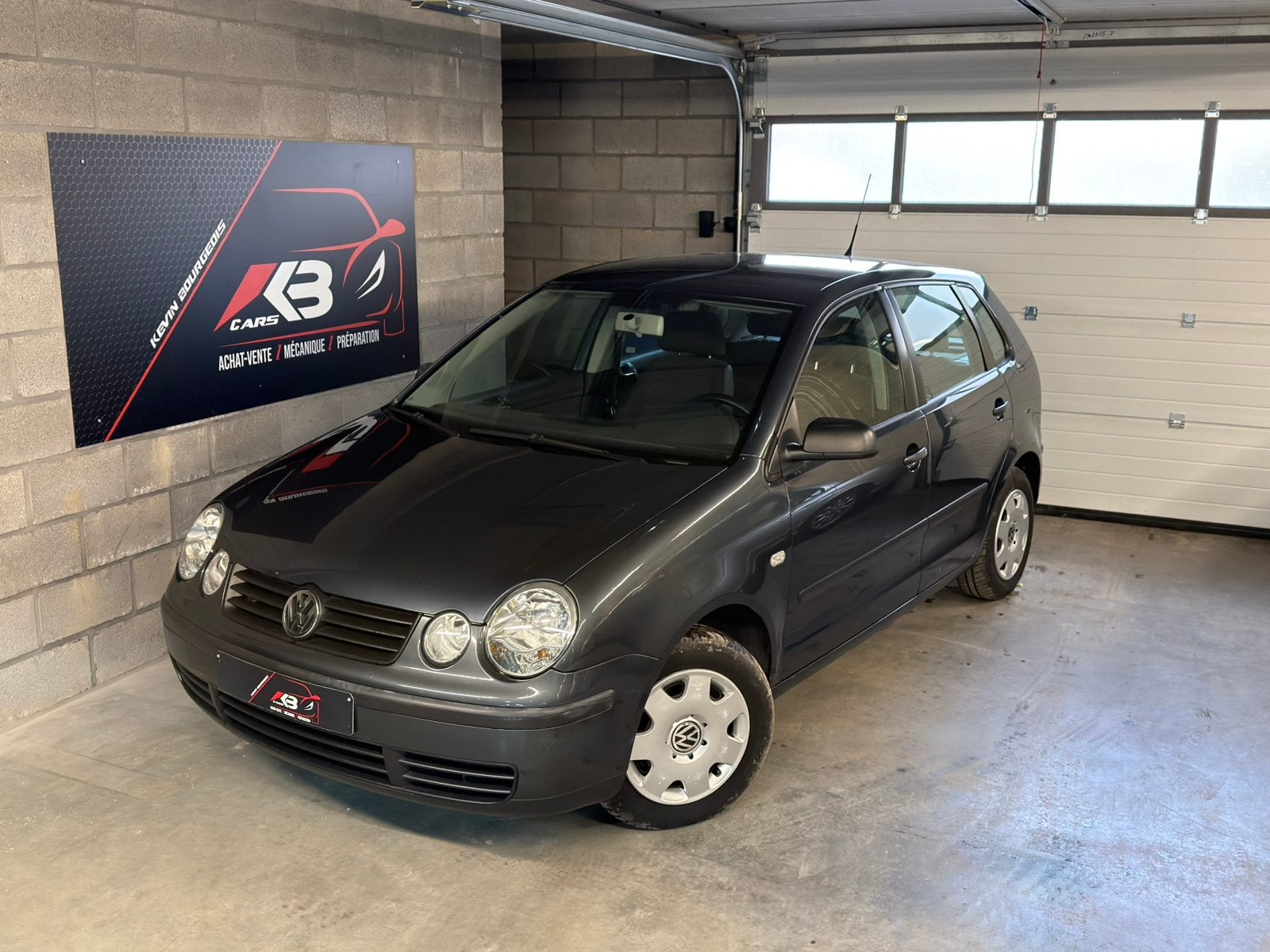 VW Polo 9N1 • 100.000 Kms • 1.2 Benzine 65PK • 2005, Auto's, Voorwielaandrijving, Dealer onderhouden, Stof, Zwart