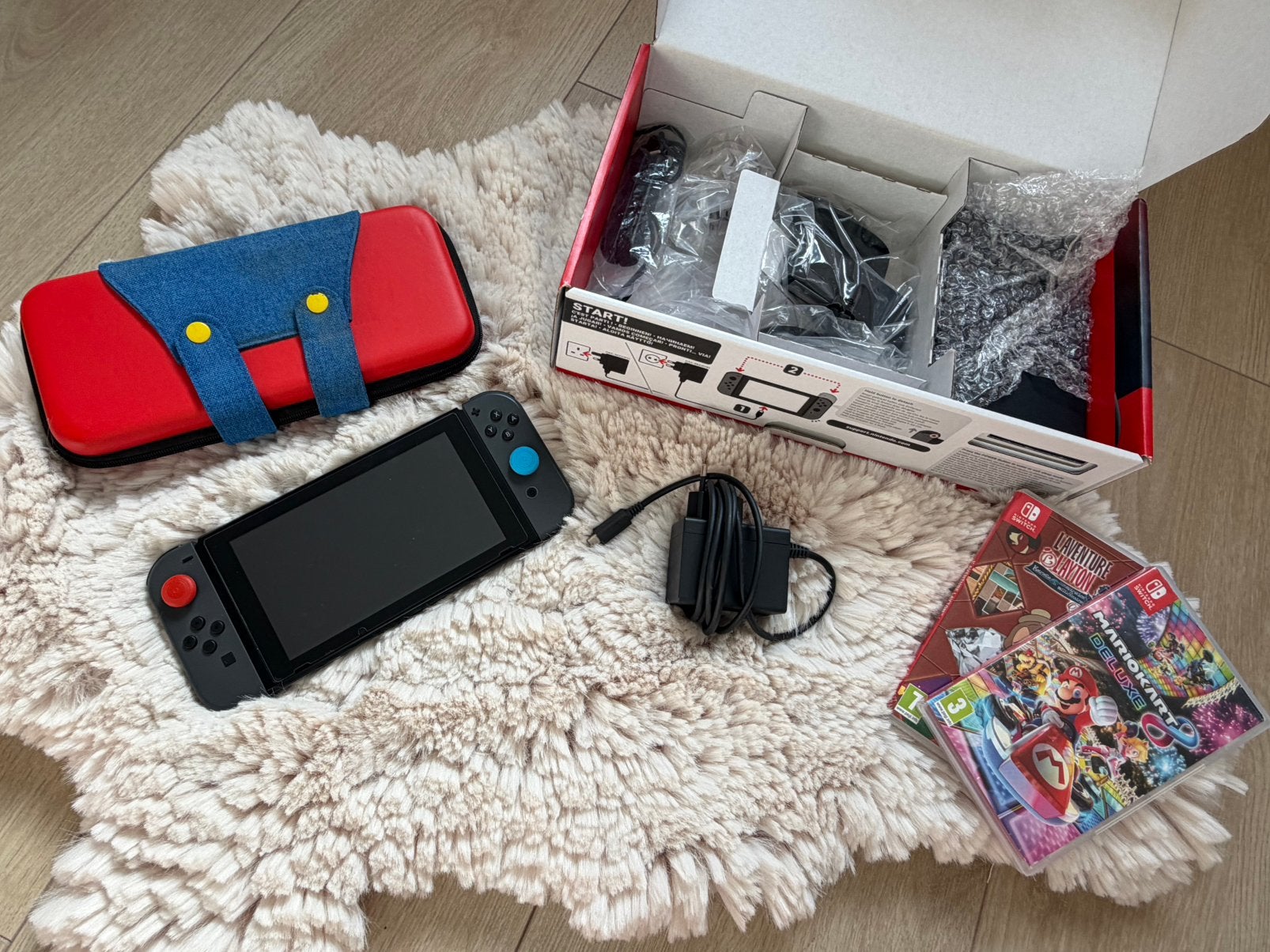Nintendo Switch V2 + 2 games — Zeer goede staat, Games en Spelcomputers, Ophalen, Overige kleuren, Refurbished, Met beschermhoes of tas