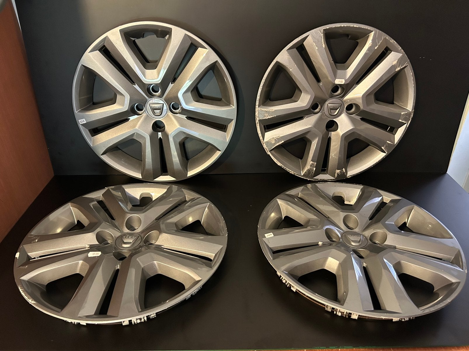 4 enjoliveurs d’origine Dacia Sandero dokker jogger 16", Autos : Divers, Enjoliveurs, Utilisé, Enlèvement ou Envoi