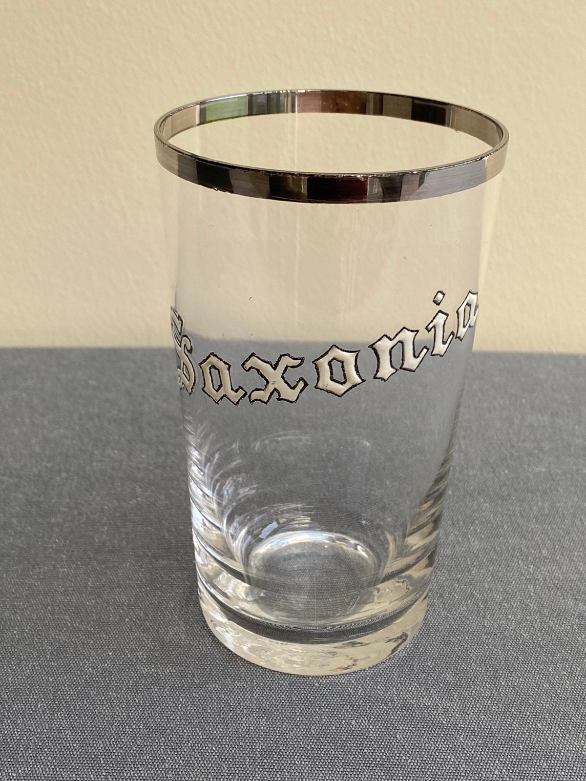 Emaille glas SAXONIA brouwerij TIVOLI - Antwerpen, Ophalen of Verzenden, Gebruikt, Glas of Glazen