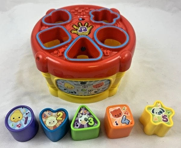 VTech vormen trommel vormenstoof 5 vormpjes muziek geluid, Kinderen en Baby's, Speelgoed | Babyspeelgoed, Verzenden, Zo goed als nieuw
