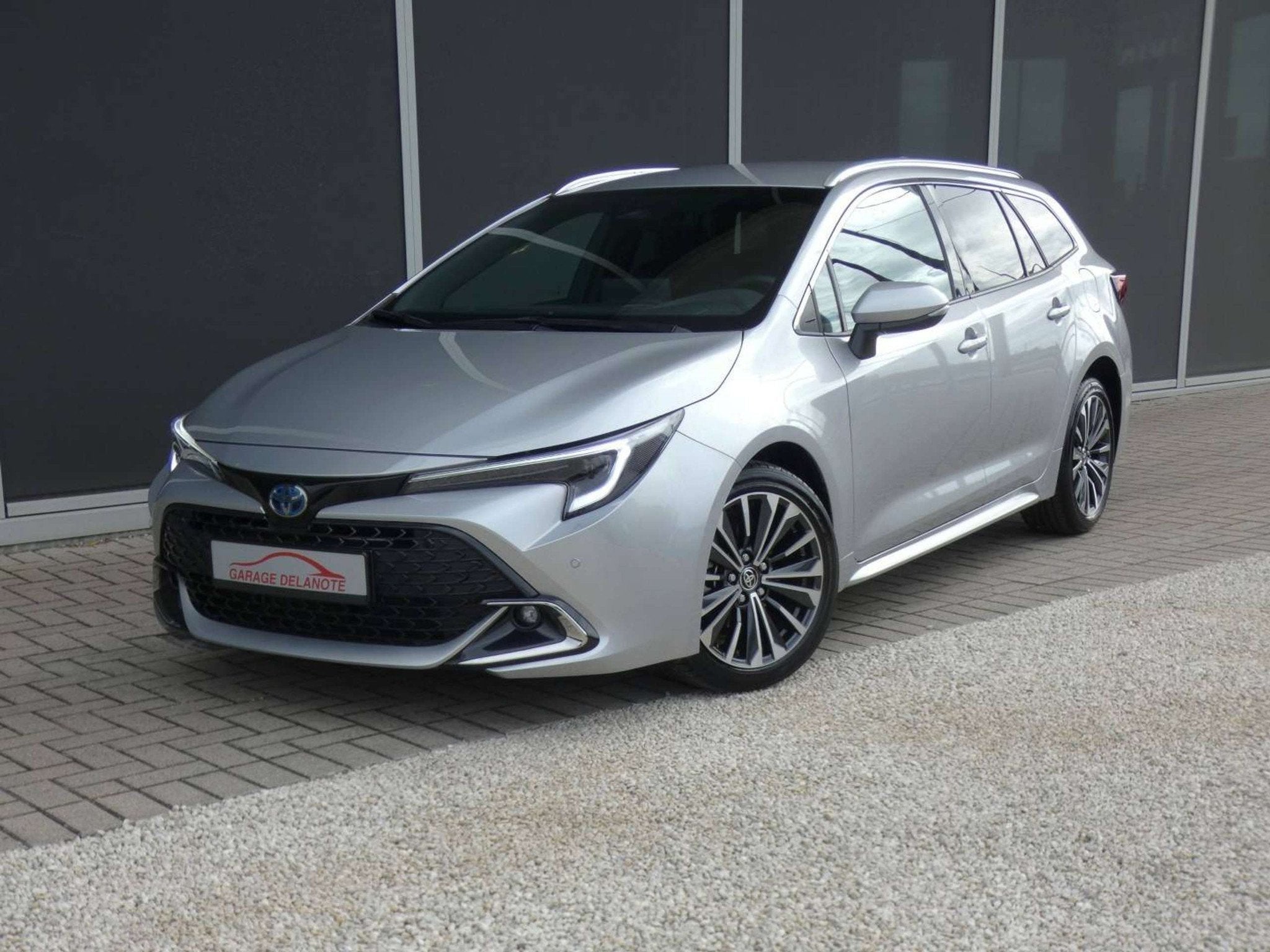 Toyota Corolla 1.8 Hybrid STYLE+TECH PACK 140pk +Elektrische, Auto's, 1300 kg, Gebruikt, Zwart, 4 cilinders