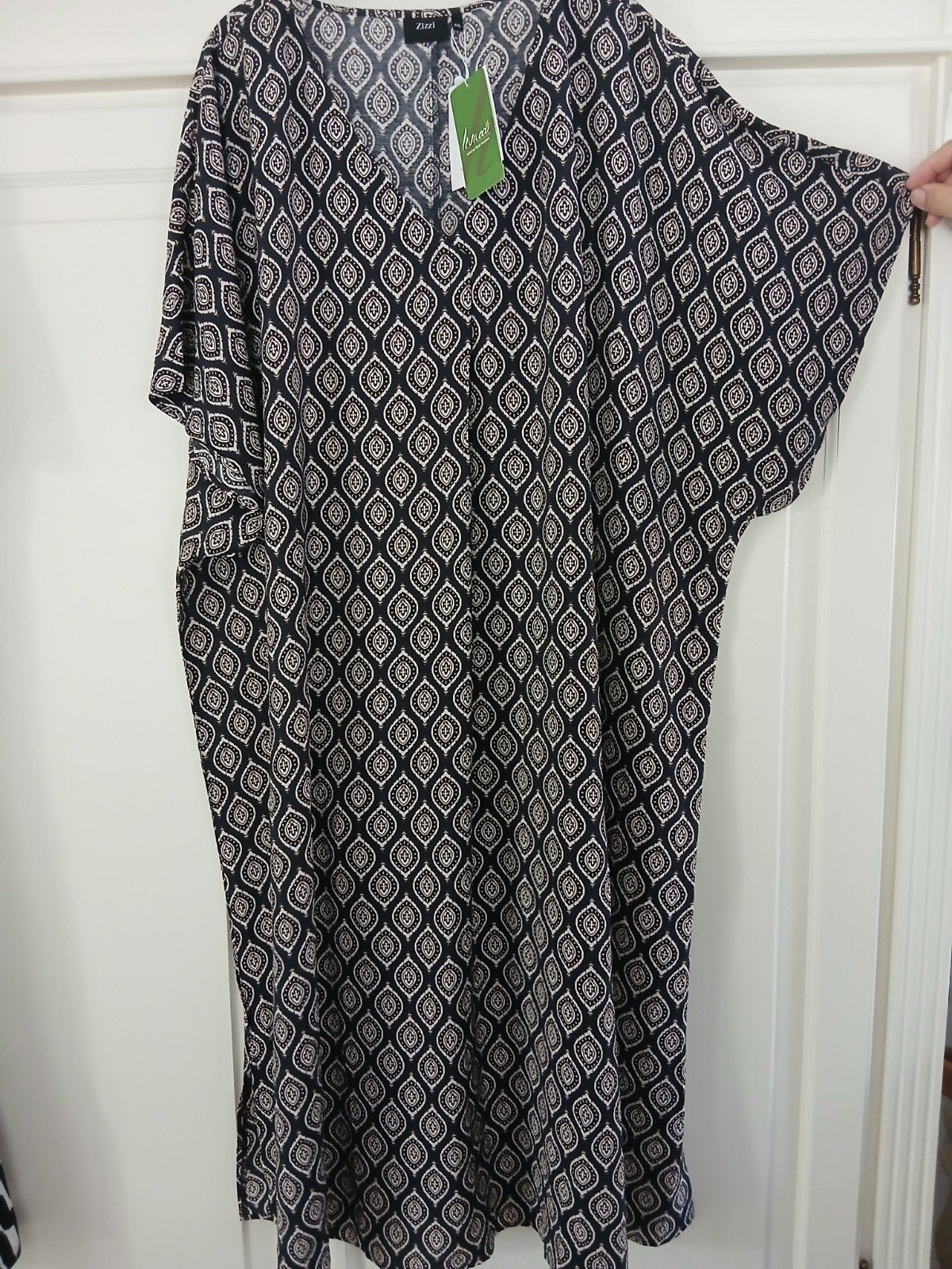 nieuw kleed MT58/60 oksel-oksel 84 lengte 1,28m met splitjes, Kleding | Dames, Grote Maten, Ophalen of Verzenden