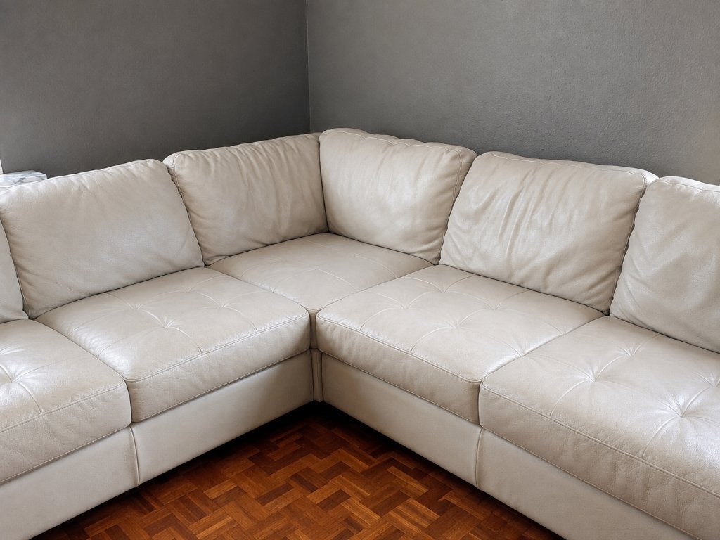 Natuzzi lederen hoekzetel met longchair  – €347 incl. btw, Huis en Inrichting, Ophalen, Gebruikt, Leer, Tijdloos design