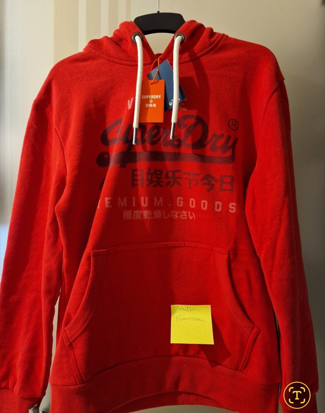 sweater merk Superdry, Enlèvement