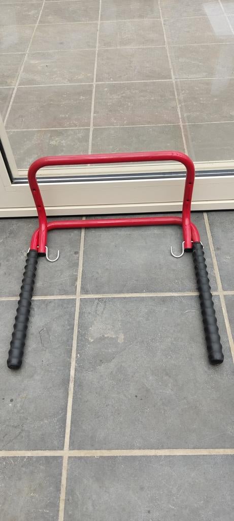 Inklapbare fietsendrager voor muurmontage, Ophalen