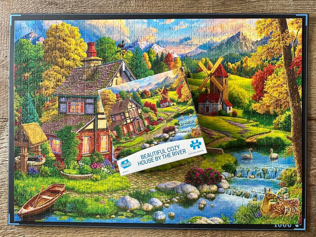 Goliath puzzel “beautiful cozy house by the river” 1000st, Hobby en Vrije tijd, Ophalen of Verzenden, 500 t/m 1500 stukjes, Gebruikt