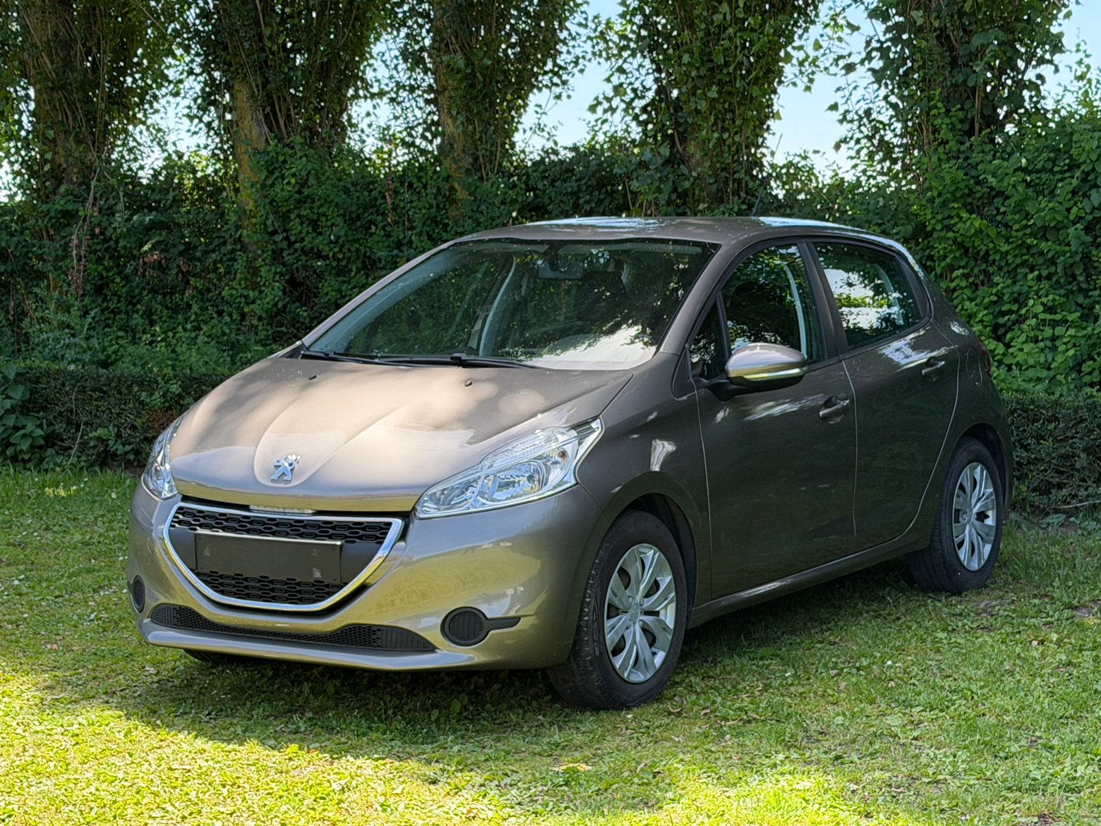 Peugeot 208 * 1.2 * 84640 km * Airco * Benzine *, Voorwielaandrijving, Euro 5, Stof, Zwart