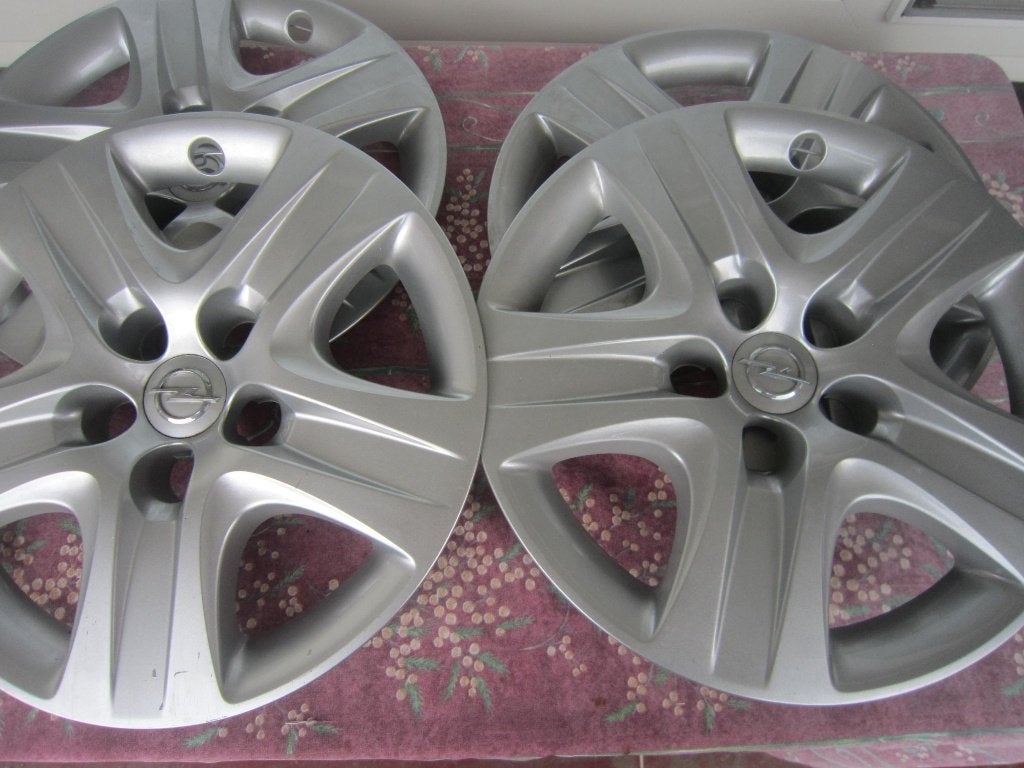 4 wieldoppen 17 inch  opel, Ophalen