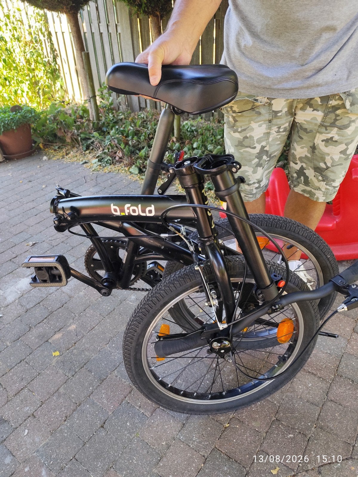 vélo pliable noir B-fold, Enlèvement